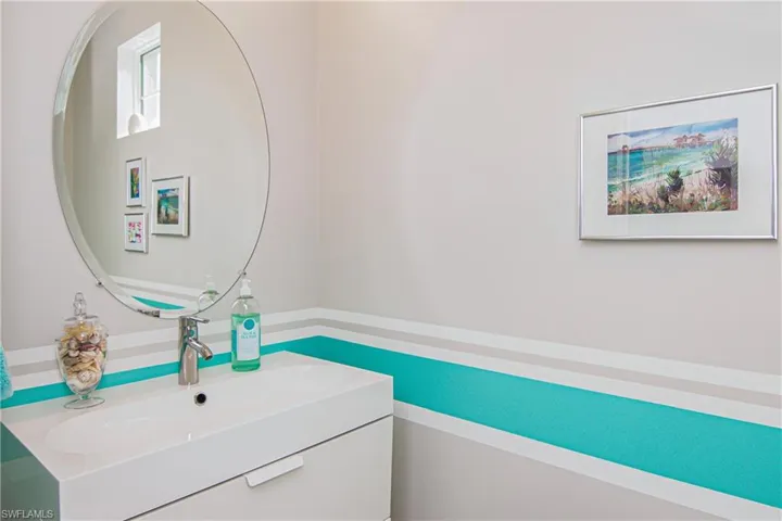Powder room with upgraded contemporary vanity.