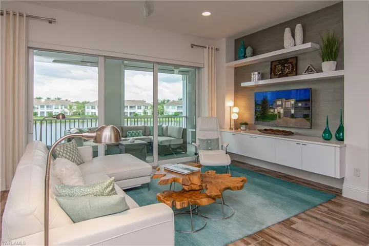 Great room with custom built-in entertainment unit.