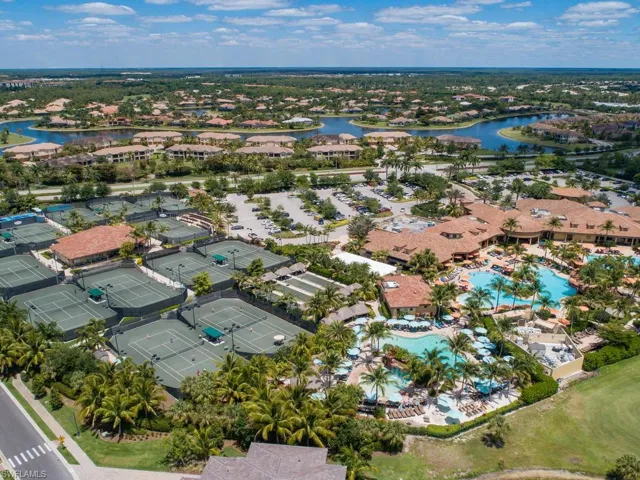 Signature Club owners have the only private entrance of all 41 Lely Resort communities to the Players Club (walkway to private gate in lower left of photo).  13 Har-tru tennis court, fully staffed pro shop, USTA and CTA league play, lessons, 2 pickle ball courts, basketball court and 4 bocce courts make this the place to be for active lifestyles.