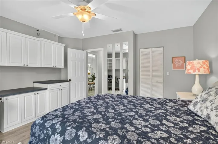 Bedroom featuring light wood finished floors and ceiling fan