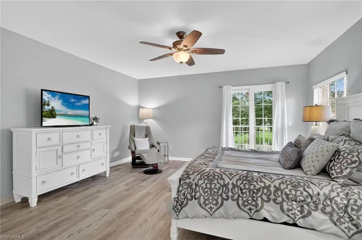 Bedroom featuring light wood-style floors and ceiling fan