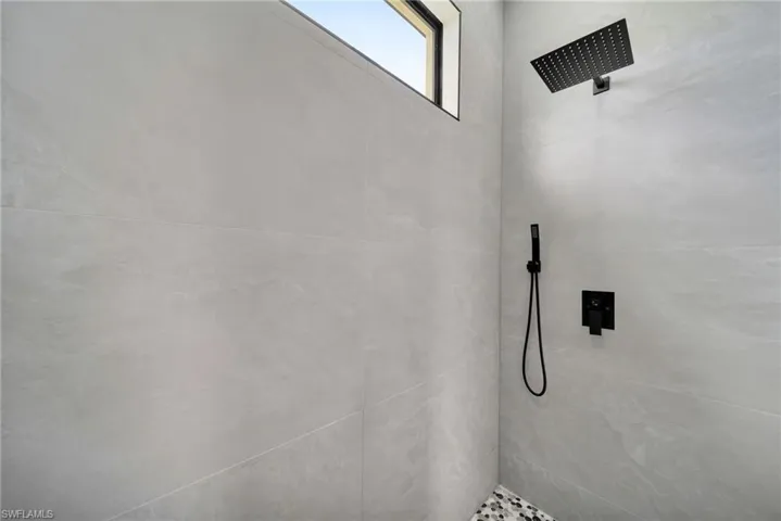 Bathroom with a tile shower