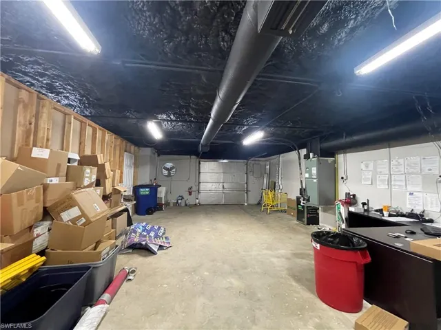 Garage featuring heating unit