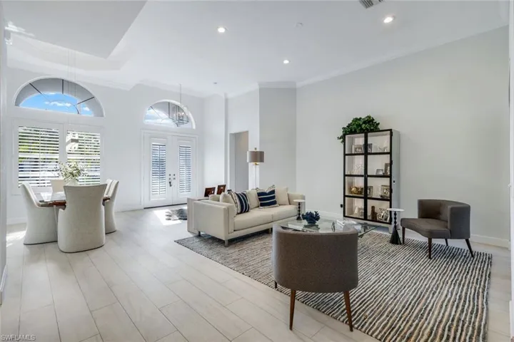 Living and dining room collide for formal entertaining