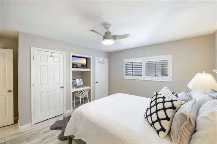 Bedroom featuring light wood-style flooring and ceiling fan