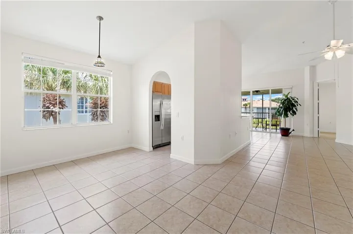 Spacious interior featuring tile flooring throughout