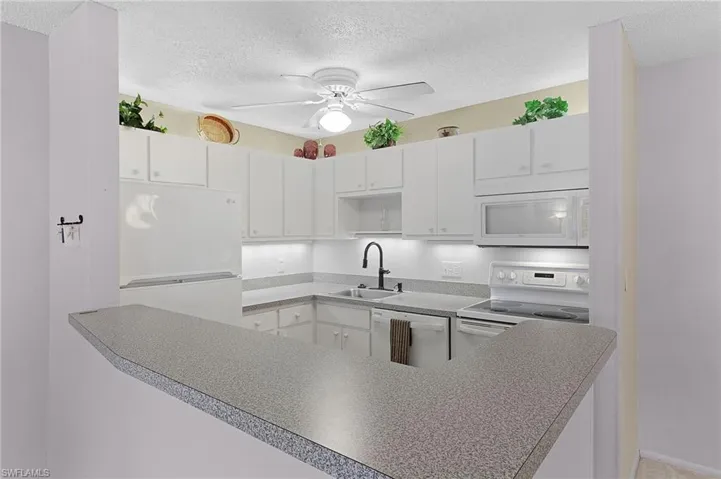 Counter lighting & above indirect lighting in kitchen.