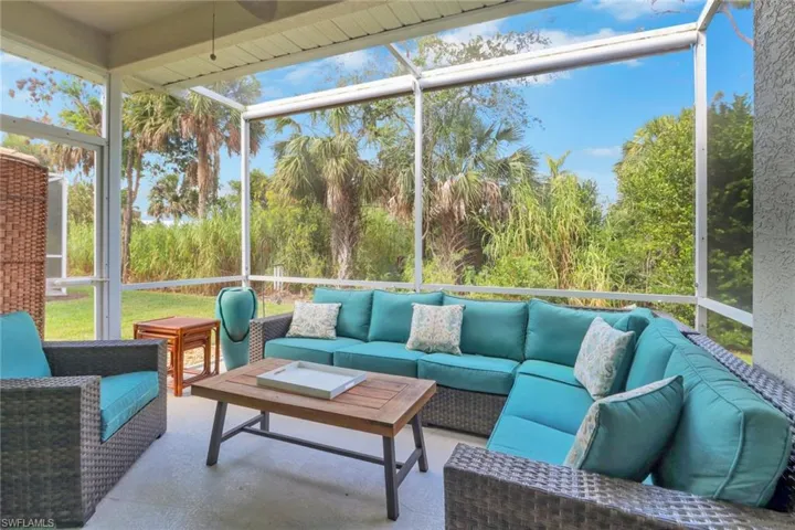Sunroom / solarium featuring a healthy amount of sunlight