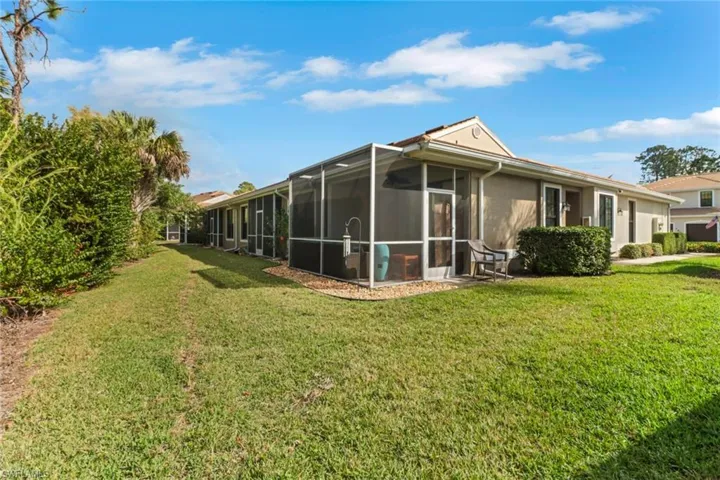 View of home's exterior with a lawn
