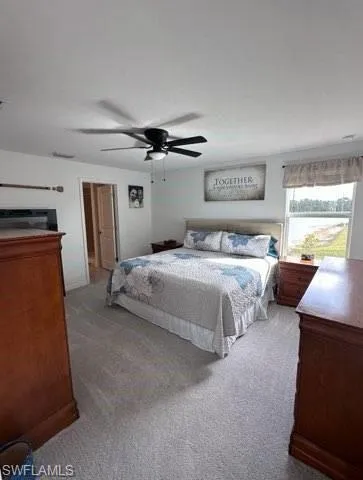 Bedroom with carpet floors and ceiling fan
