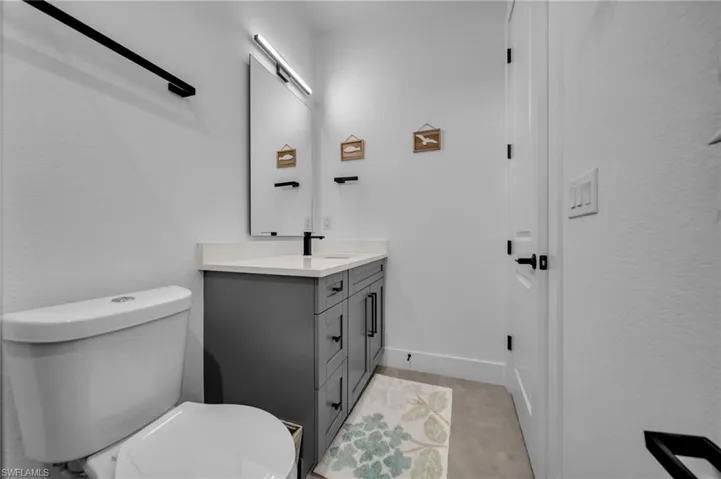 Bathroom with toilet and vanity
