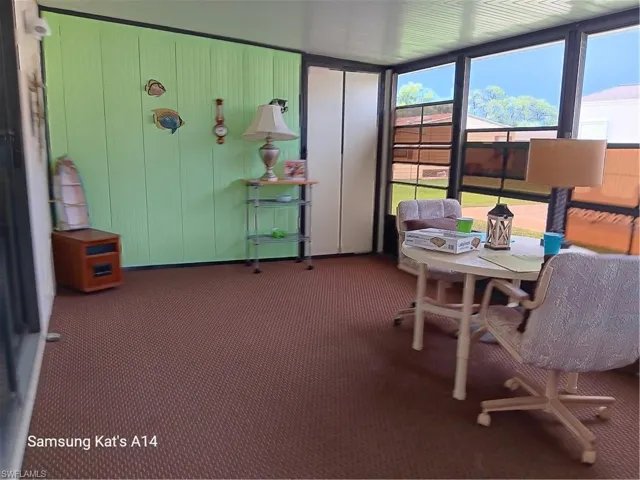 with adjustable windows and sun protecting sliders and door to laundry room