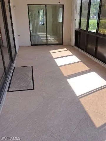 Fully enclosed Lanai with sliders to the Master Bedroom