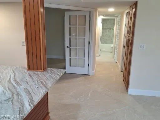 Hallway leading to the 2nd & 3rd bedrooms as well as the utility room and 2nd bathroom