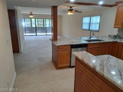 Main front door entry view with Kitchen on right and Dining/Living area leading to Lanai and Master Bed/Bath