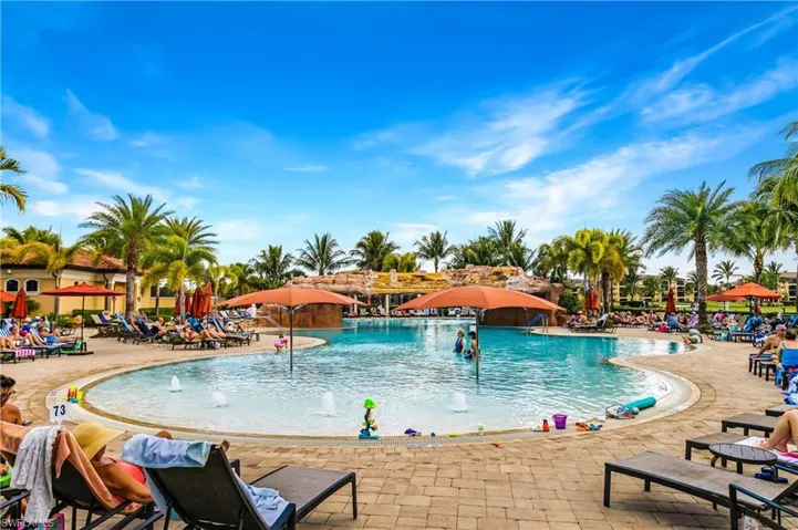 Community pool with a patio area