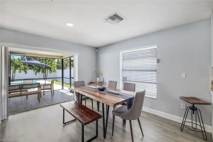 Dining space featuring a healthy amount of sunlight and light wood-type flooring