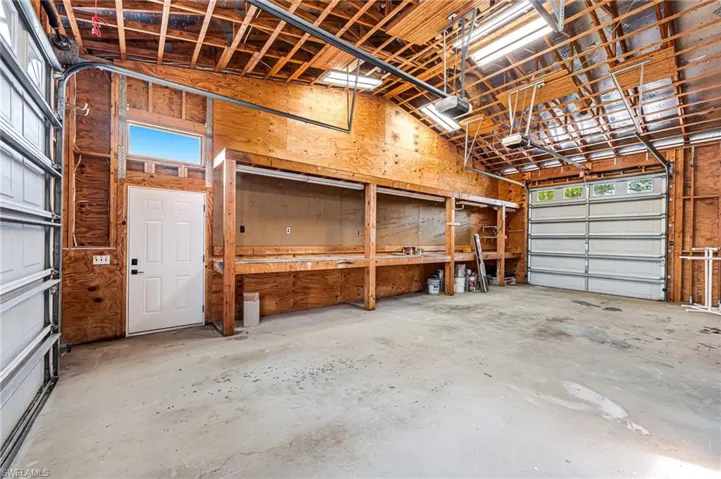 Oversized 2 car, pass through garage with front and rear garage doors