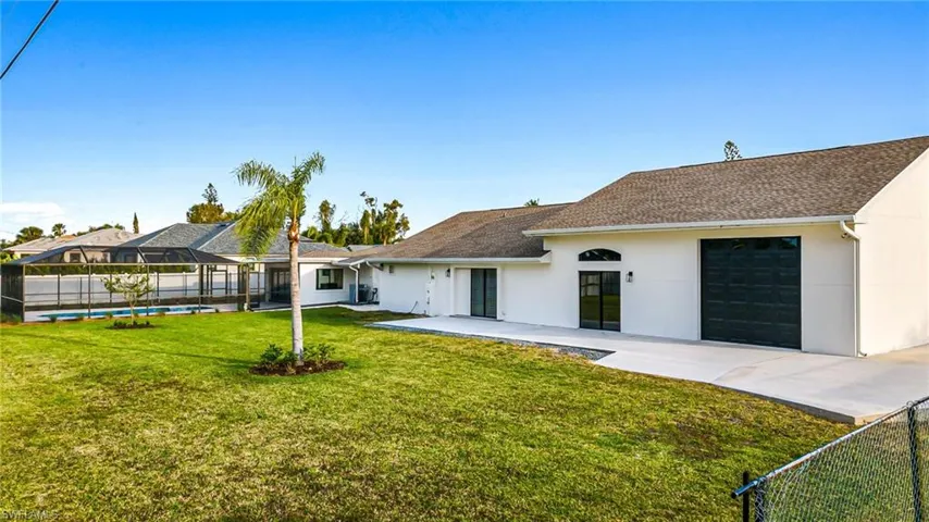 RV/Boat side driveway with pass through garage with front and rear garage doors