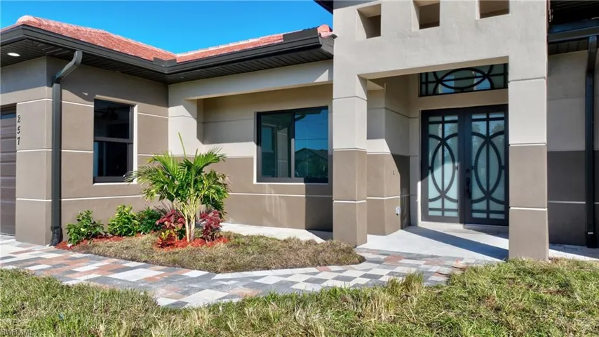 Property entrance with french doors