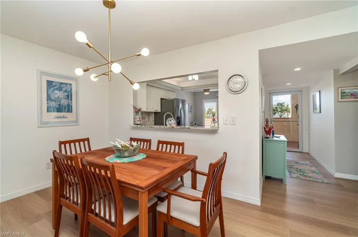 Dining area with pass-through window to kitchen