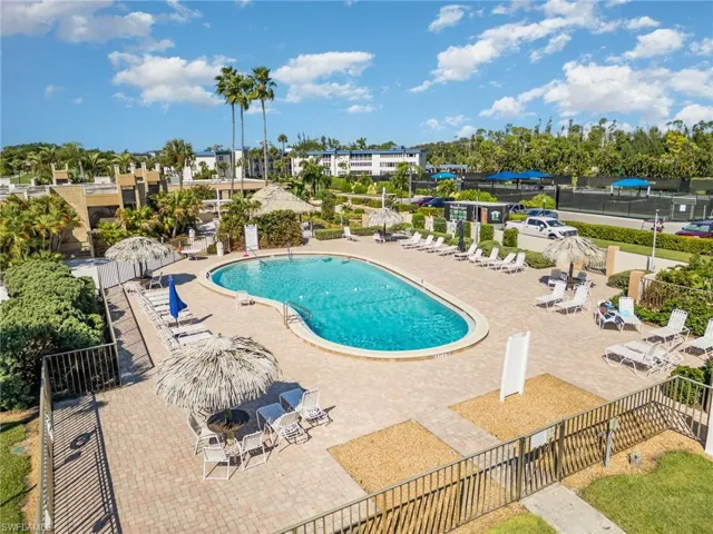 Community pool with a patio area