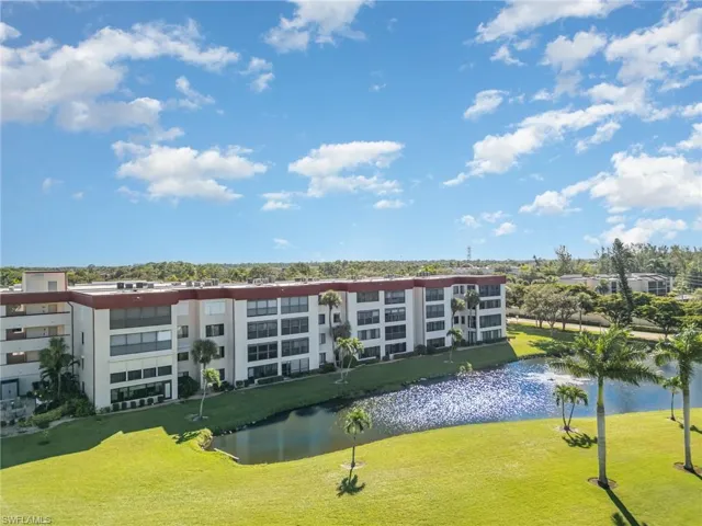 Back of building #23 with view of the lake and golf course
