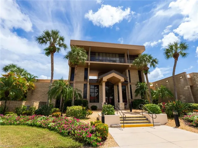 View of front of house featuring a balcony