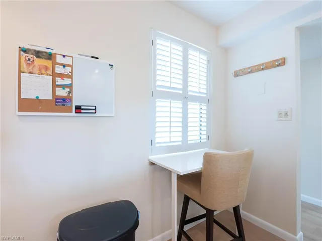 Office space featuring light wood-type flooring