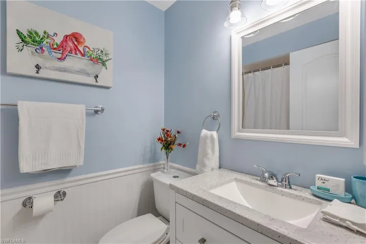 Bathroom with toilet and vanity