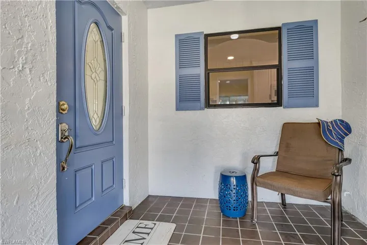 View of front sitting area on screened porch