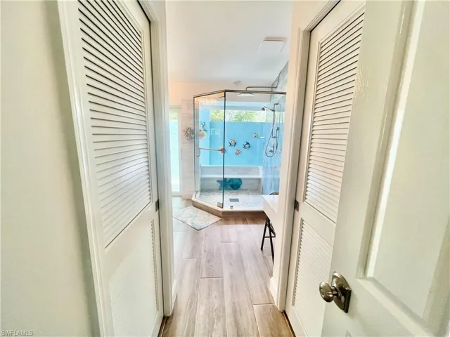 Access to ensuite primary bathroom with dual walk in closets.