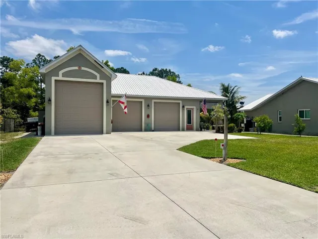 2240 Square foot detached garage with extra high doors for boat and MOTOR COACH parking.