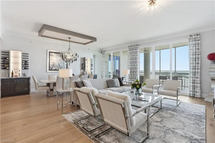 Floor to ceiling windows flood the space with natural light.