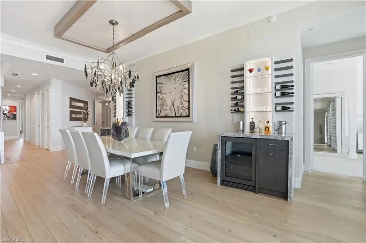 Formal dining space with 2 built in bar areas.