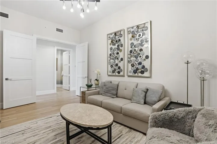 The den is thoughtfully tucked away from the main living space.