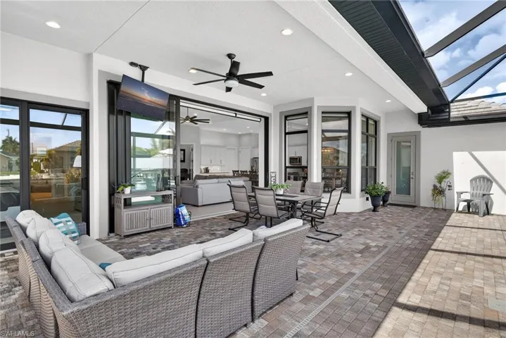 View of patio with an outdoor living / dining area