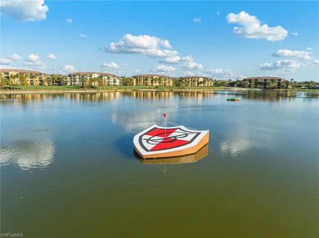 Water view featuring a dock
