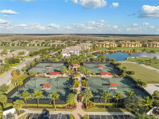 Drone / aerial view of a large body of water and a golf course