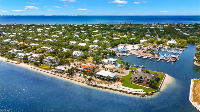 Bird's eye view featuring a beach view and a water view