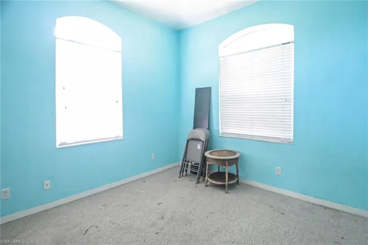 Spare room featuring carpet floors