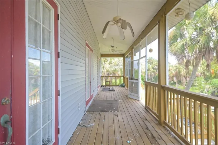 Wooden deck with ceiling fan