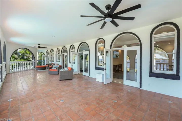 View of patio / terrace with ceiling fan and french doors