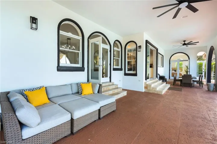 View of patio featuring outdoor lounge area and ceiling fan