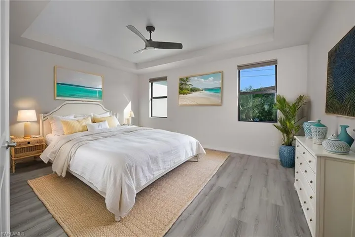 The master bedroom has been virtually staged