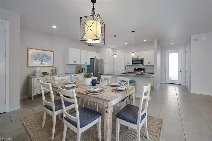 The dining room has been virtually staged