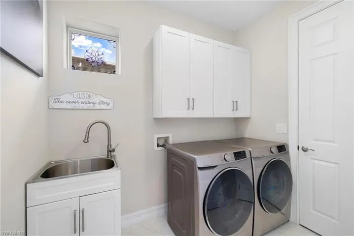 Laundry Showing Door Closed to Primary Closet