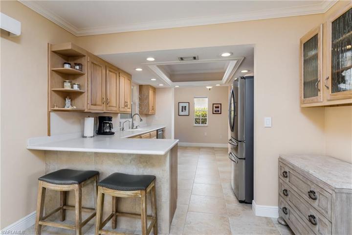 CUSTOM CABINETS AND BREAKFAST BAR