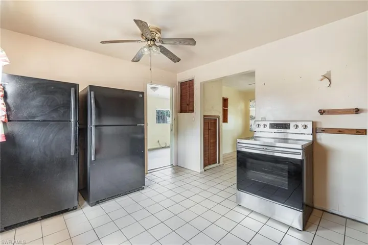 Kitchen offering 2 refrigerators