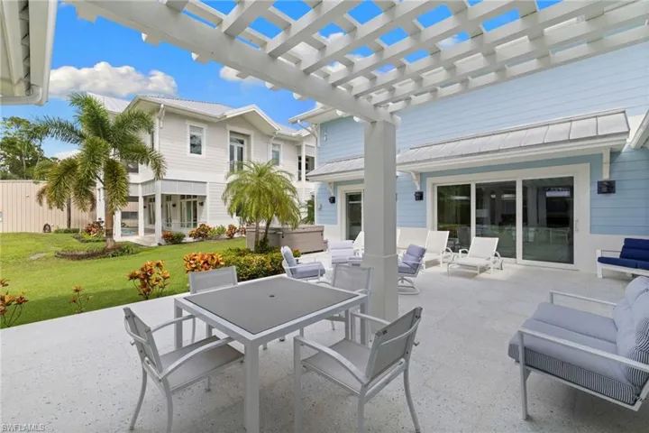 View of patio / terrace with an outdoor living space and a pergola